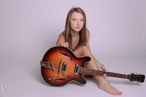 Sweet-Kira-and-her-guitar-x111-h6xkmq1yyl.jpg